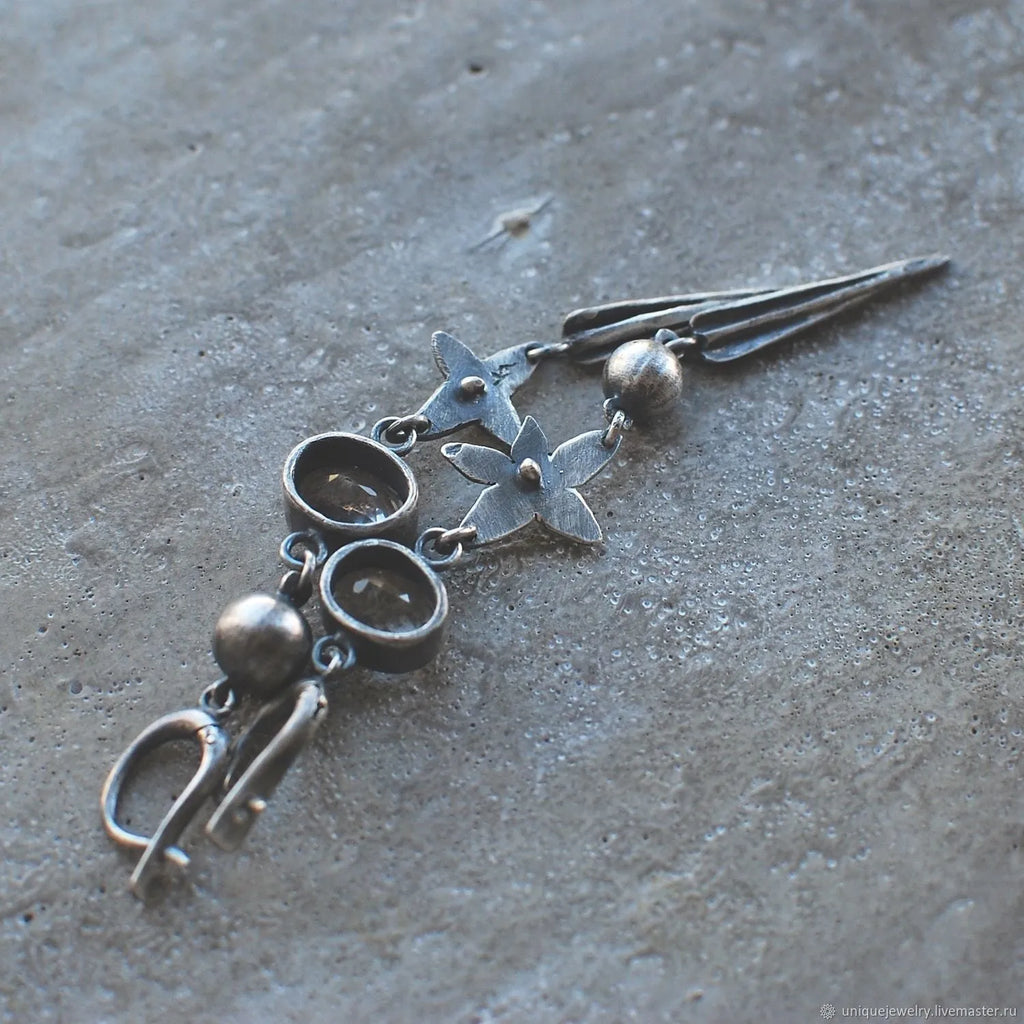 Geometric long pendant ear studs with antique silver plating and rhinestone XINGX detailing