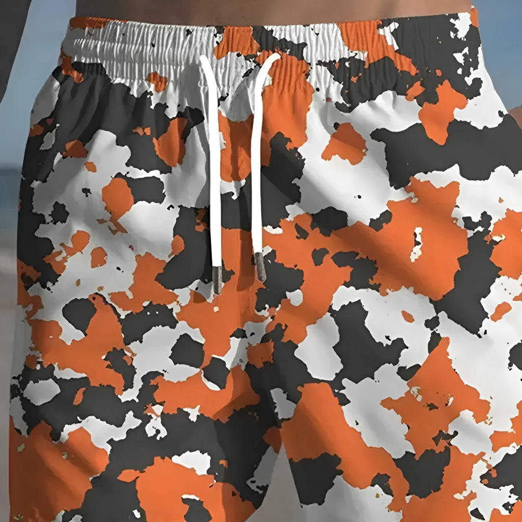 Men's polyester beach shorts with micro elasticity in a printed streetwear design, available in multiple colours.