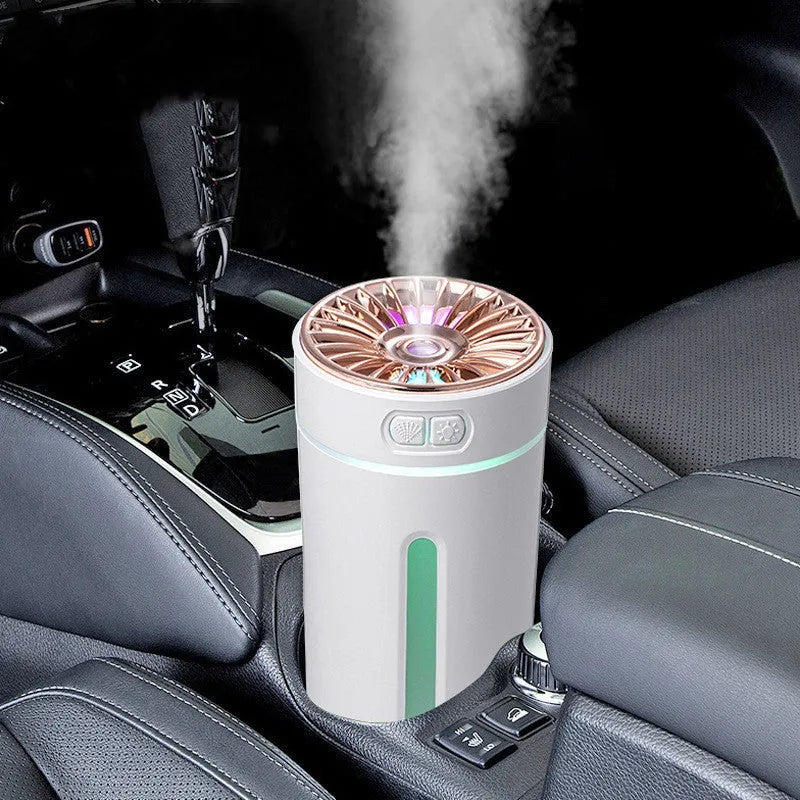 Black USB car humidifier with LED lights placed in vehicle cup holder showing mist output