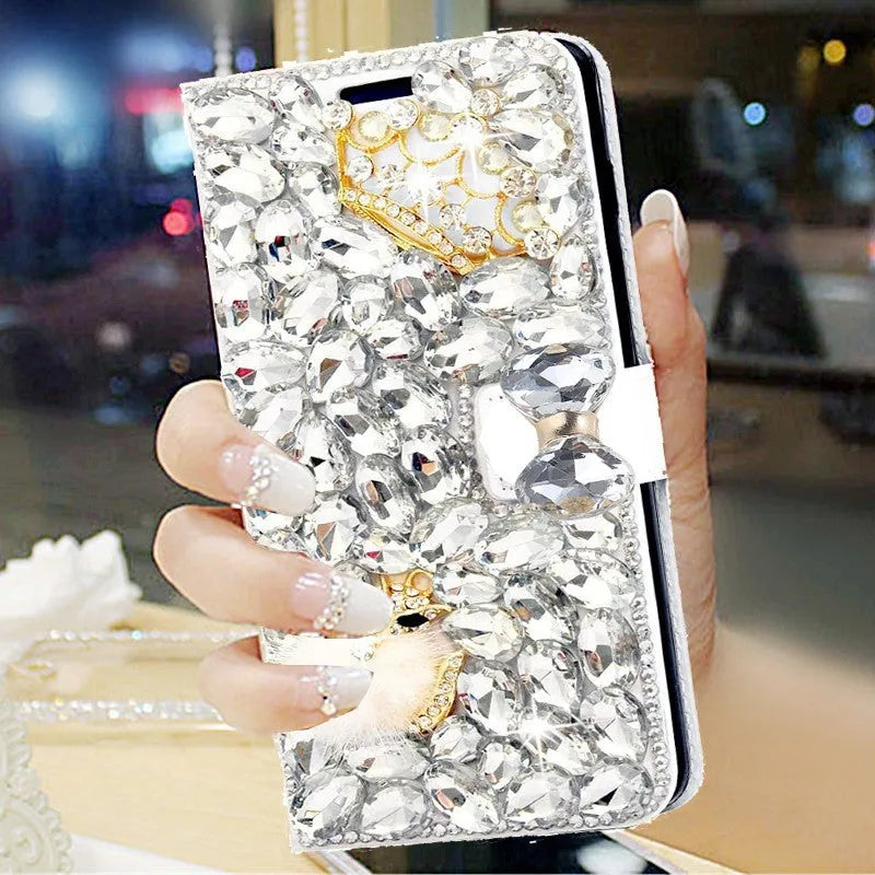 Faux leather phone case with rhinestones for iPhone 14 15 16 series in white and black designs including gem wallet and crown fox