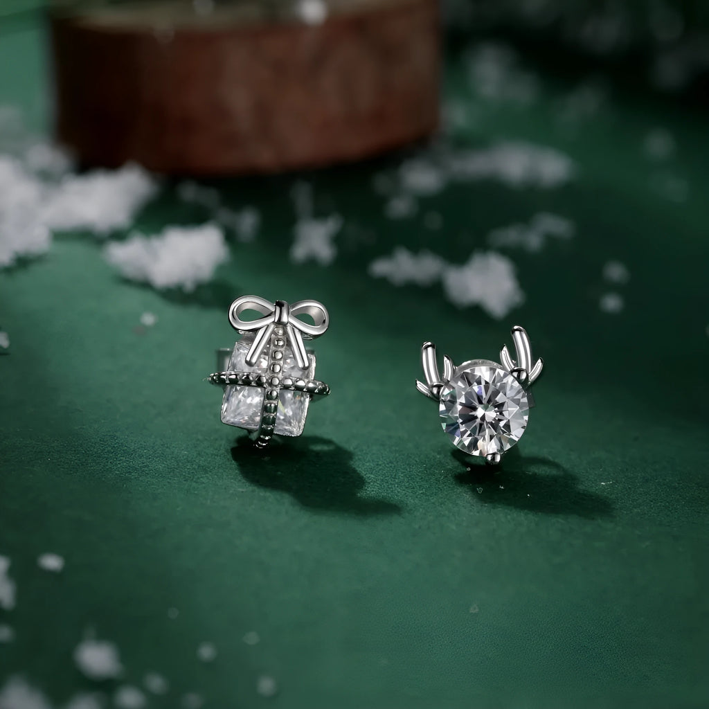 Pair of 925 sterling silver irregular bow and deer earrings with zircon inlay