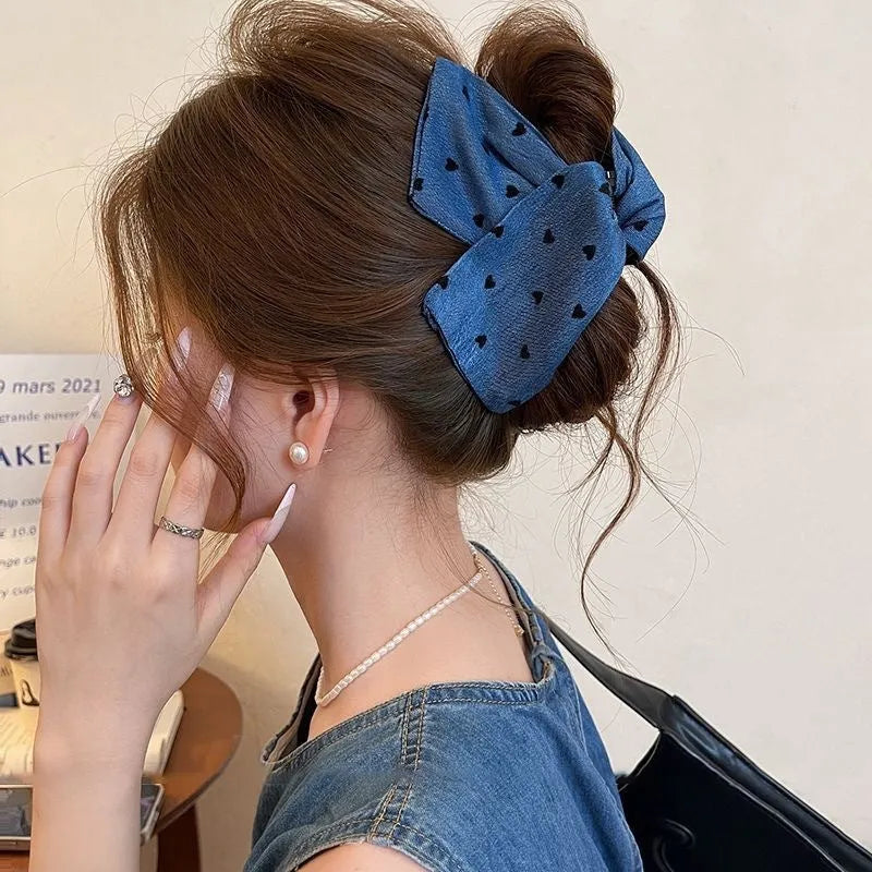 Handmade plastic hairpin with fabric and acrylic decorative elements and triangular grip