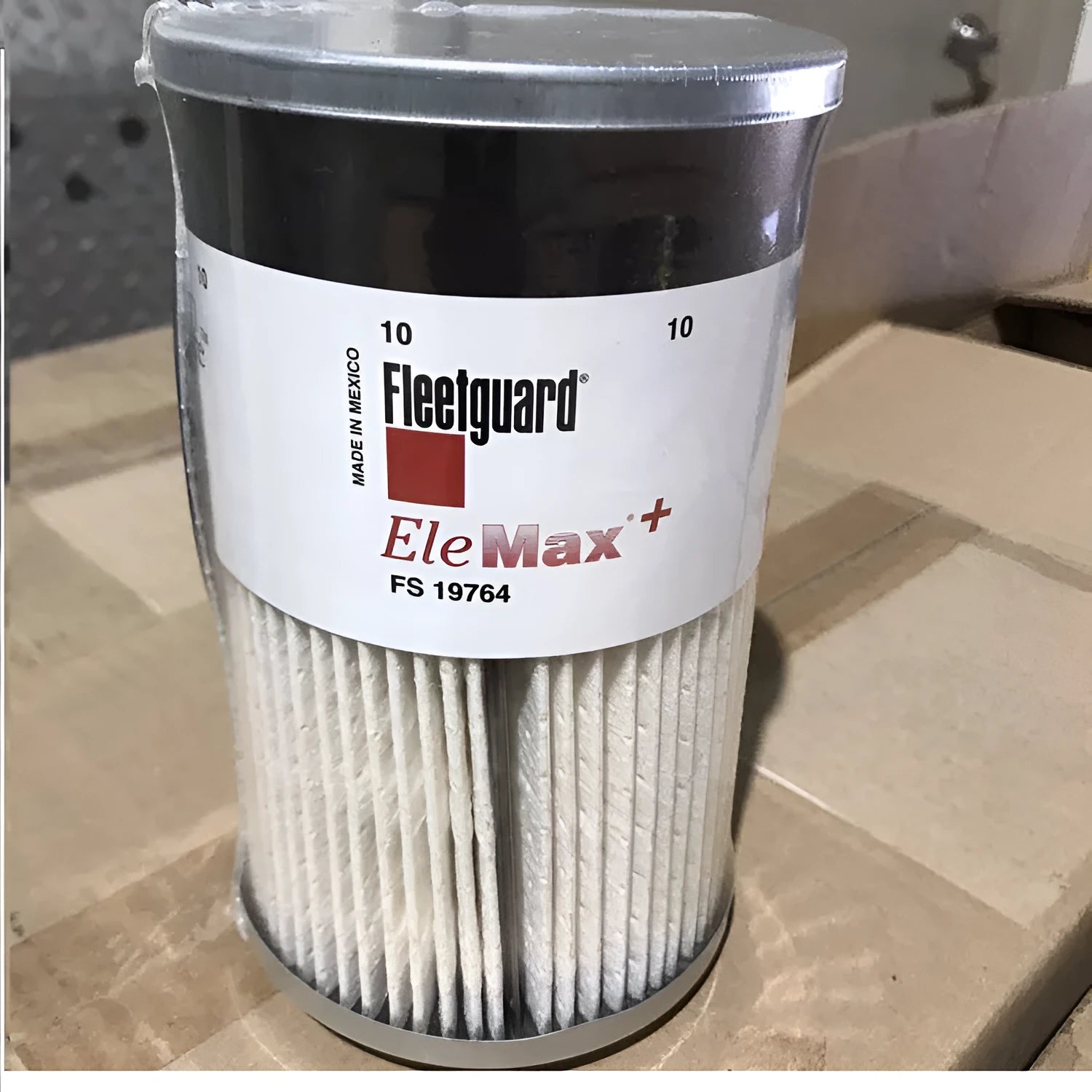 FS19764 diesel fuel filter with folding paper element, showing 10mm connection ports.