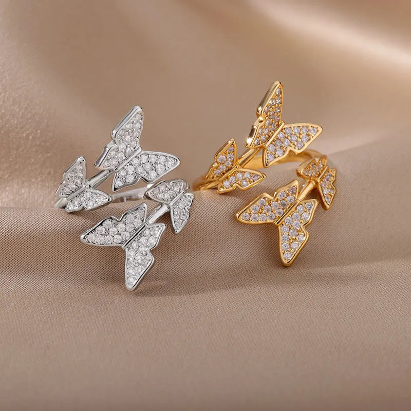 Personality zircon butterfly ring with three-dimensional design in gold tone on a white background