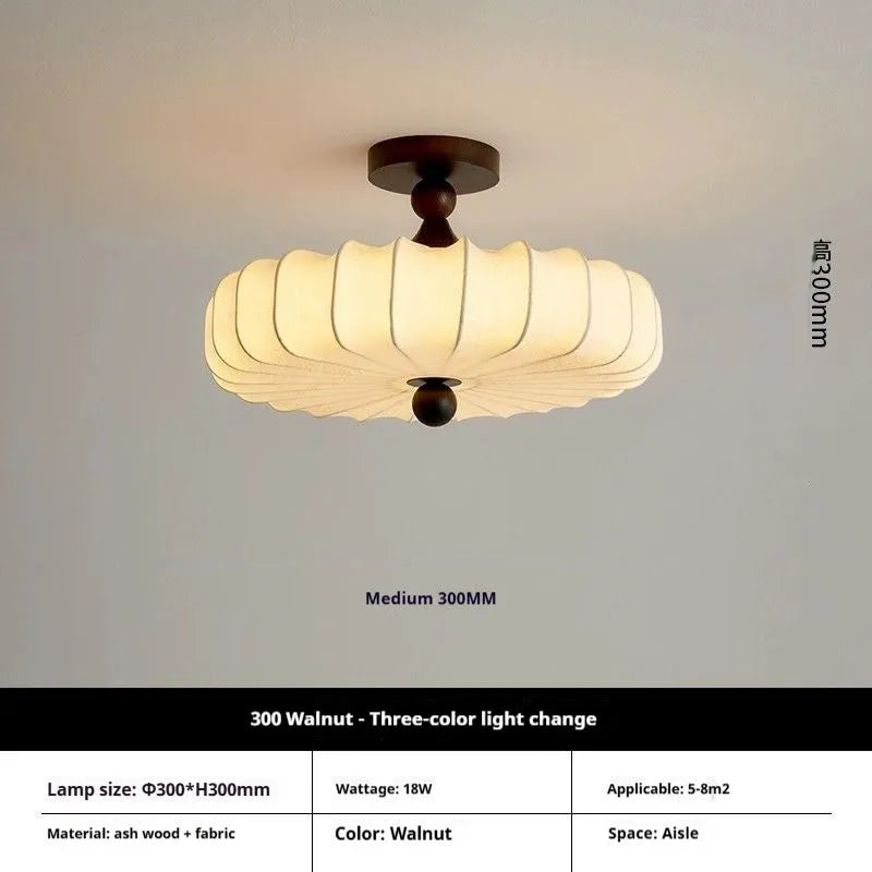 Mid-ancient French retro fabric ceiling lamp with ash wood frame in walnut colour on a ceiling