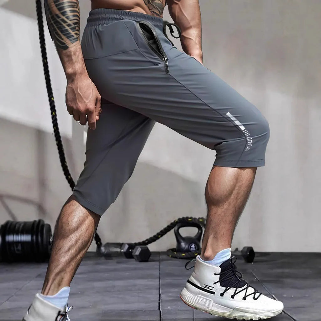 Men's cropped sports casual pants in nylon fabric with straight leg design and quick-drying properties