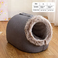 Grey fleece-lined closed cat sleeping bag bed showing enclosed nest design for winter warmth.