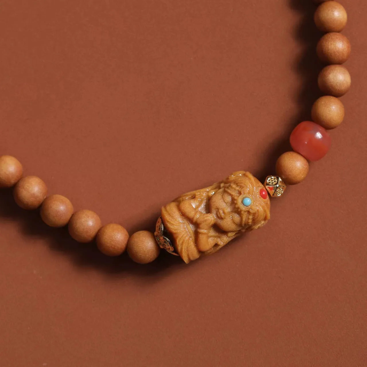 Brown wooden bracelet with double circle design featuring 6mm round beads in traditional weaving style