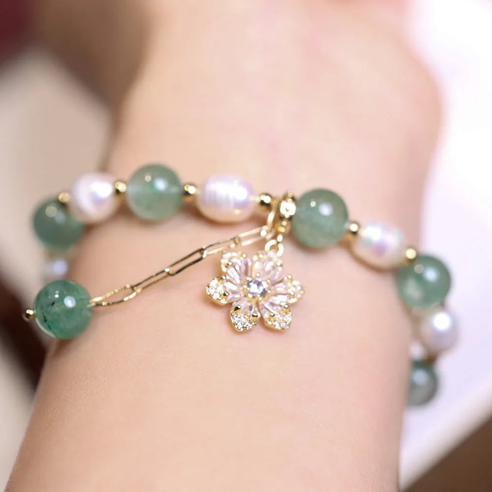 Green freshwater pearl bracelet with geometric strawberry beads and Chinese knot closure