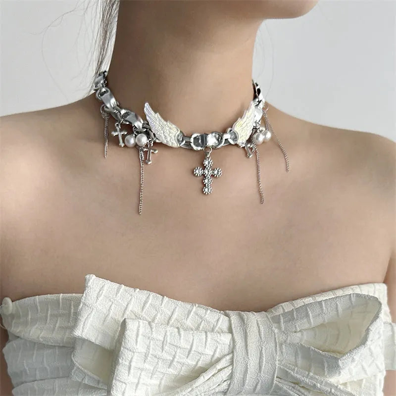 Silver zinc alloy star wings cross necklace on a clavicle chain with electroplated finish