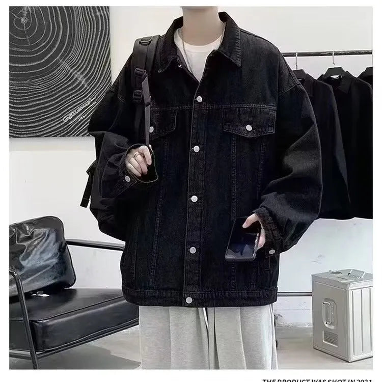 Loose-fitting denim jacket in dark blue, light blue, or black with long sleeves and straight hem, sizes M-3XL