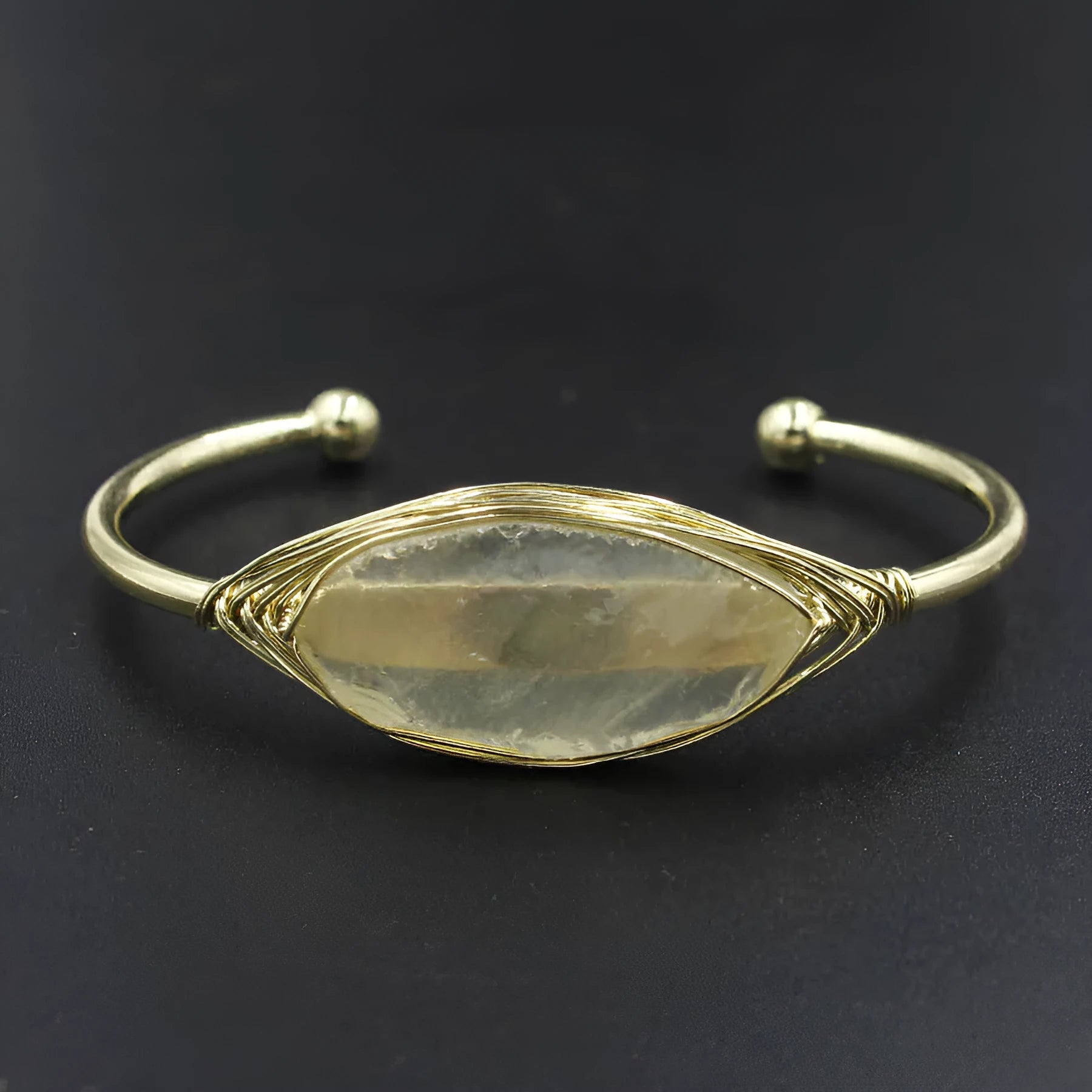 Natural raw gemstone bracelet with 8mm amorphous crystal beads on a white background.