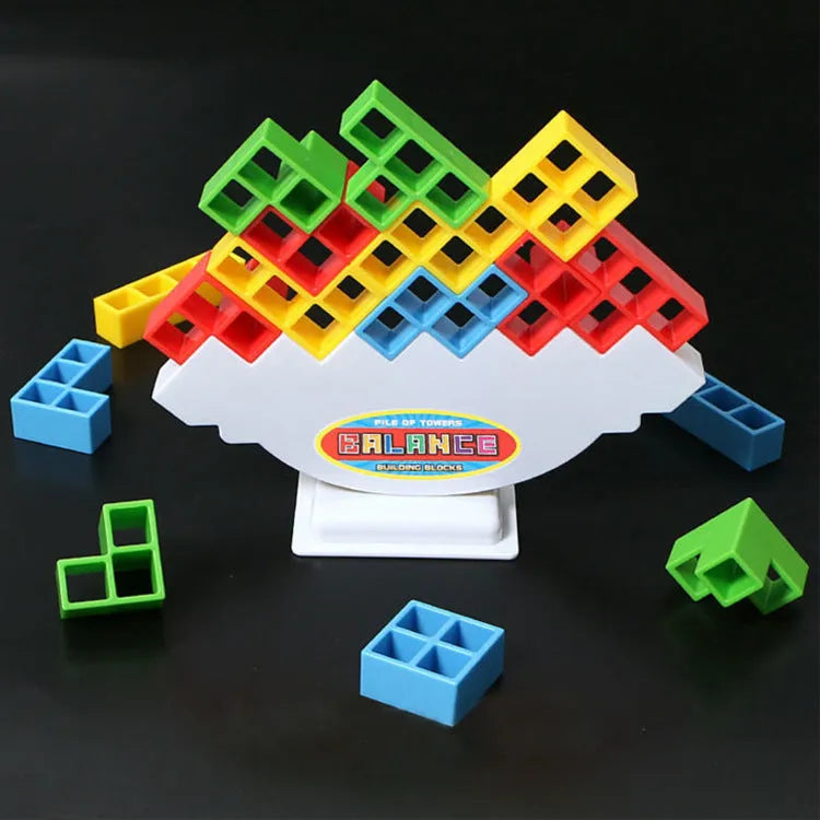 Plastic balance stacking game with 16 colourful building blocks on chassis for children aged 3+