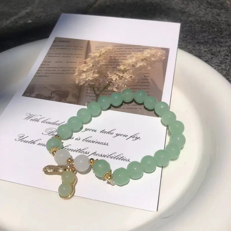 Chinese style glass bracelet with bamboo joint design elements in multiple colour options