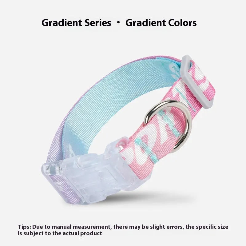 Adjustable nylon dog collar with cartoon gradient print and metal D-ring on a green background.