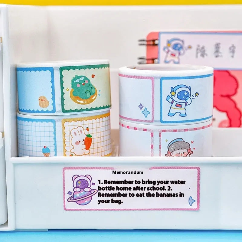 Roll of cartoon name tape stickers showing dinosaur, astronaut, rabbit, and girl design options
