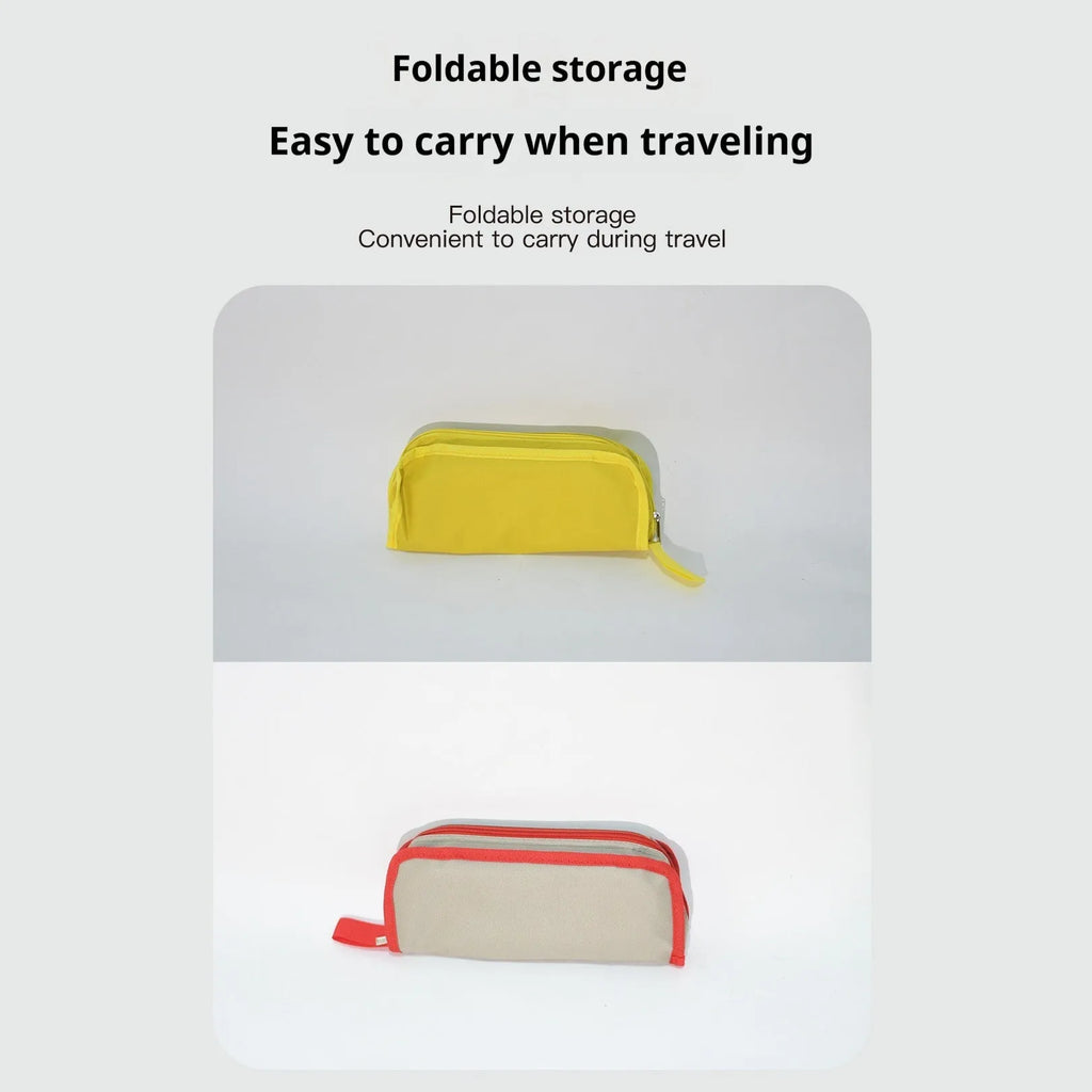 Lightweight foldable camp stool in khaki colour, shown folded flat in pencil box style.