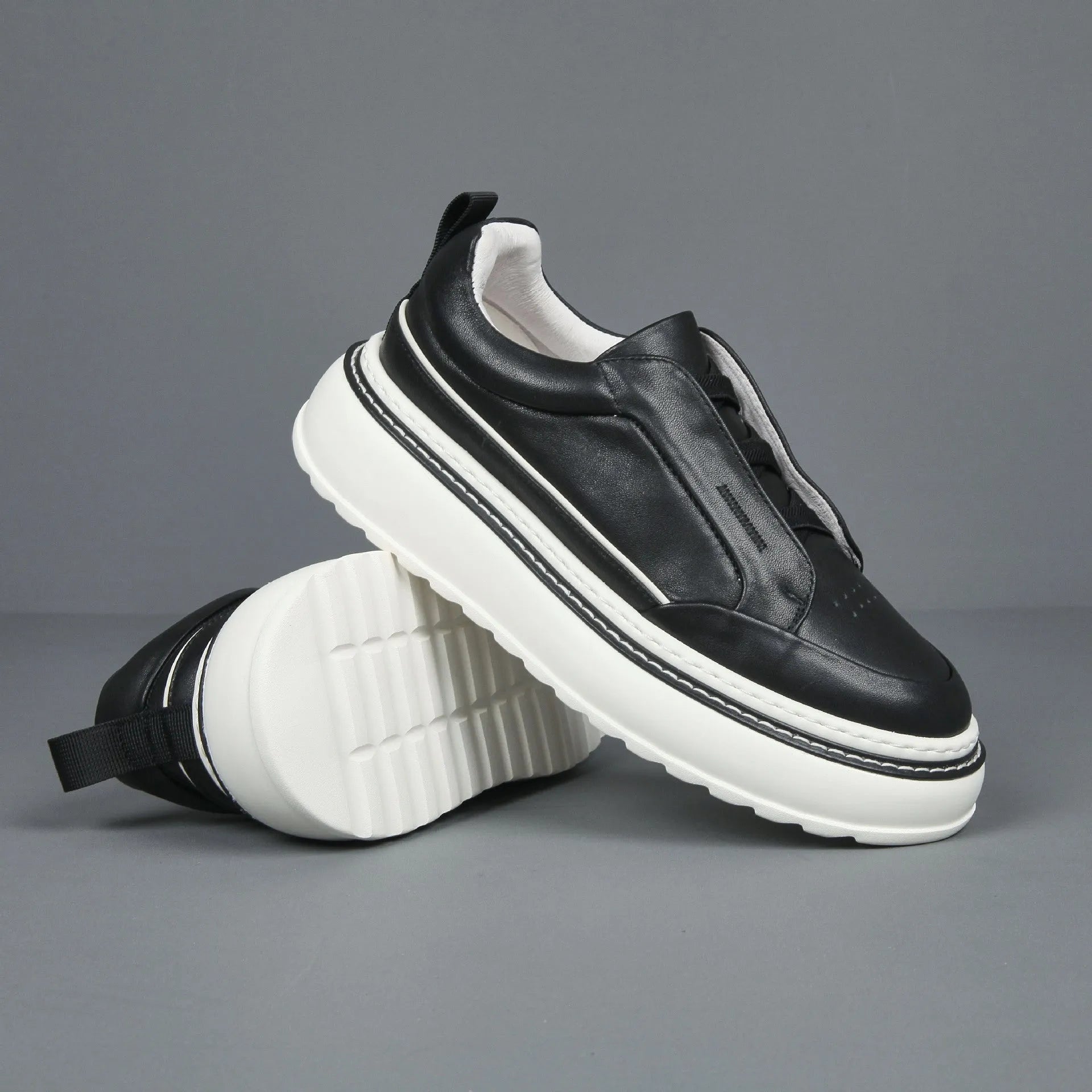 Casual slip-on sneaker in black with elastic band, first layer cowhide upper, foam sole, platform mid heel 3-5cm