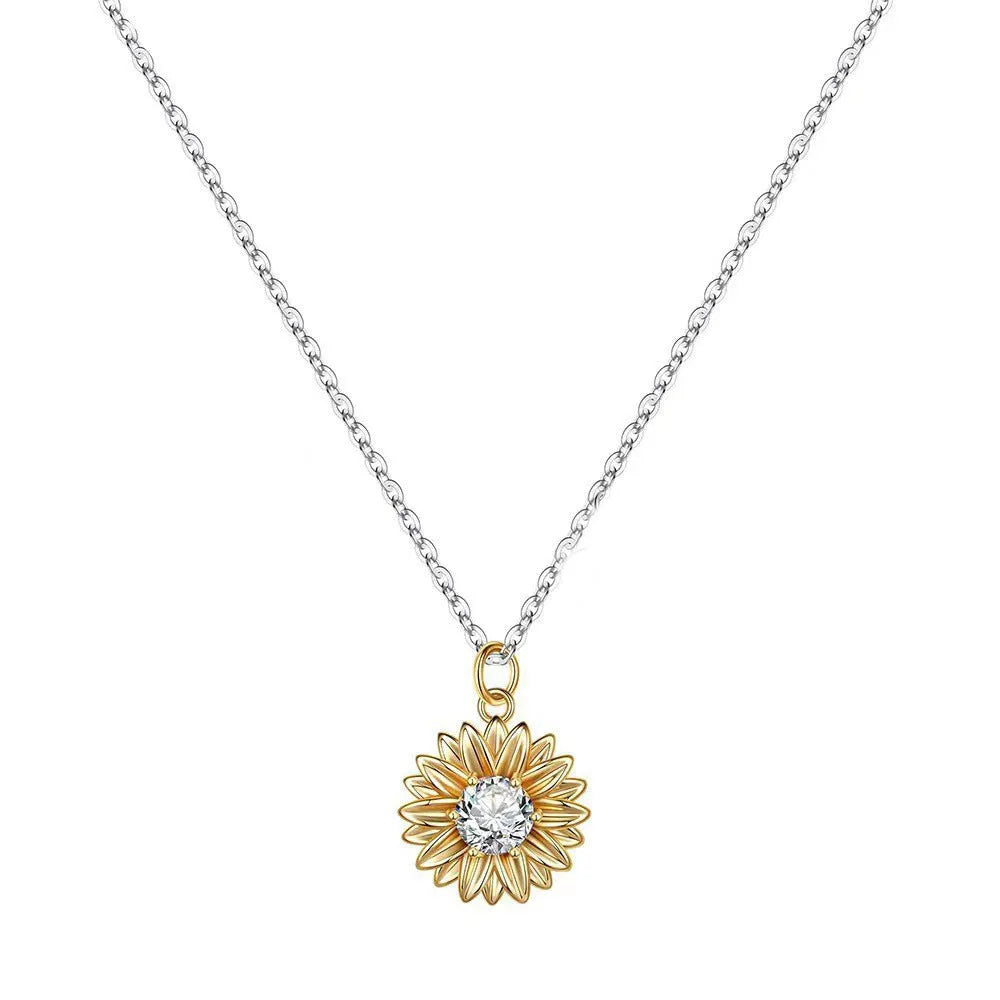 Women's adjustable sterling silver sunflower necklace with daisy petal design on a cross chain.