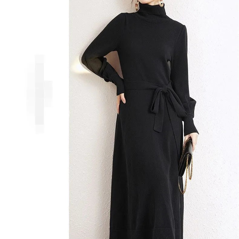 Rose red turtleneck knitted polyester dress with long sleeves, elastic waist, and a loose mid-length skirt hem.