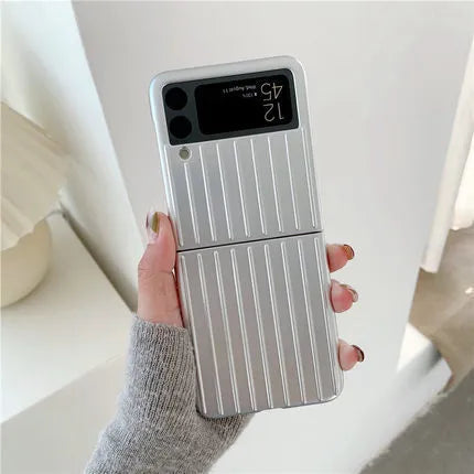 Samsung Z Flip3 folding phone in a slim, solid-colour flip case showing front and back views.