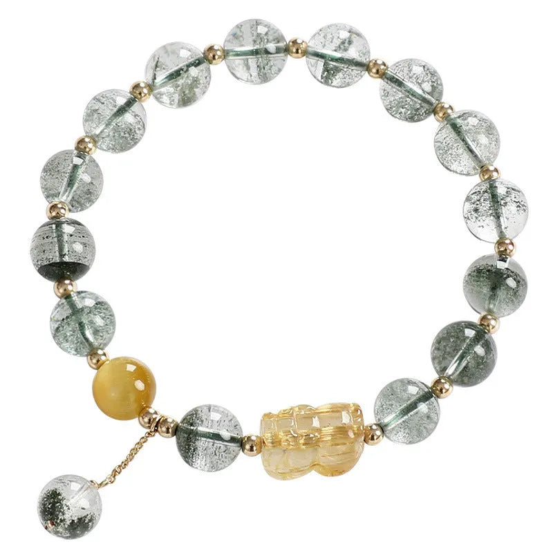 Green phantom quartz crystal bracelet with geometric design and gold rutile accents