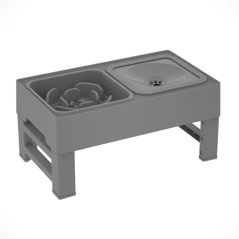 Adjustable height elevated dog feeder with slow feed and water bowls in black and grey.