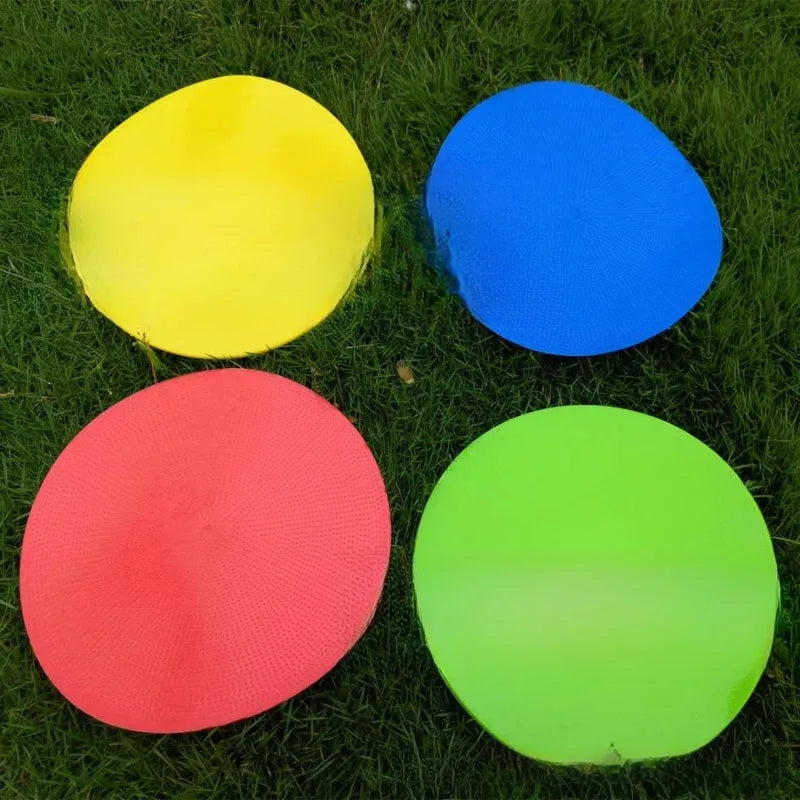 Flat circular TPE football training marker disc in bright colours for field practice.