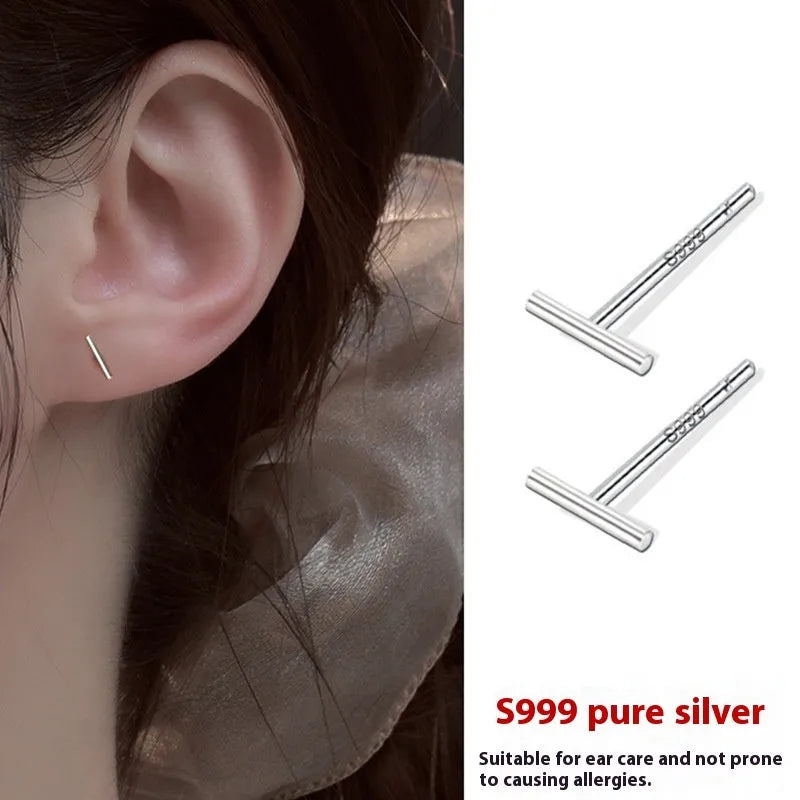 999 pure silver anti-blocking ear studs in butterfly shape on white background