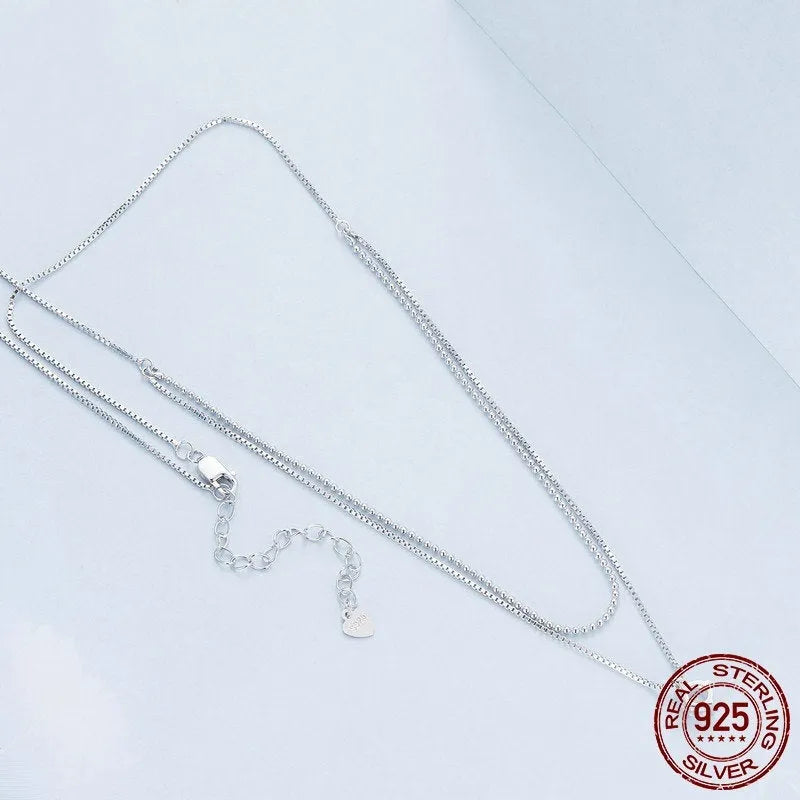 Double-layer sterling silver necklace with pearl chain and adjustable clasp