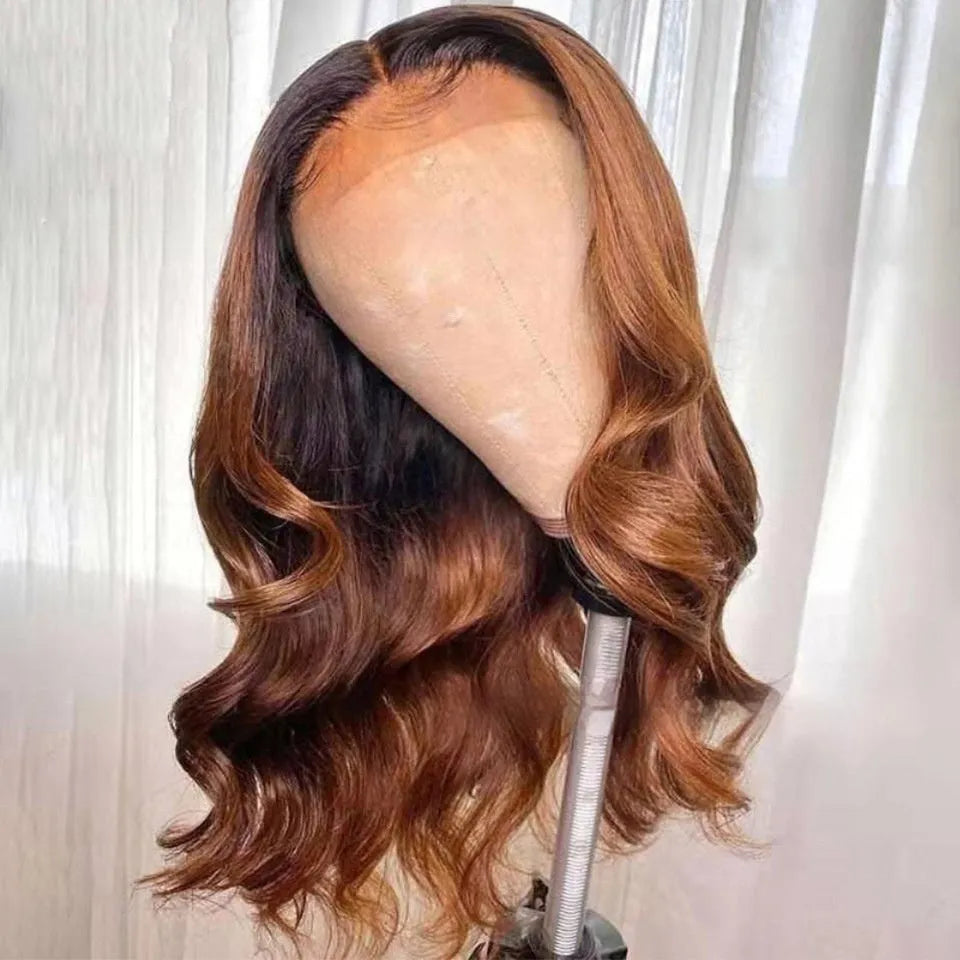 A woman wearing a long, gradient brown human hair lace front wig with a natural hairline.