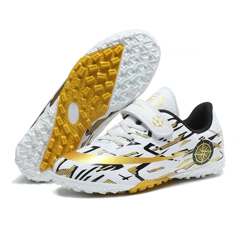 Children's football shoes with Velcro fastening, non-slip rubber outsole, and spikes in sky blue colour, low-top design