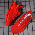 Women's lightweight FlyKnit mesh casual trainer in solid colour on a white background.