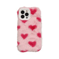 Pink silicone phone case with cartoon design for iPhone models 12, 13, 14, and 15.
