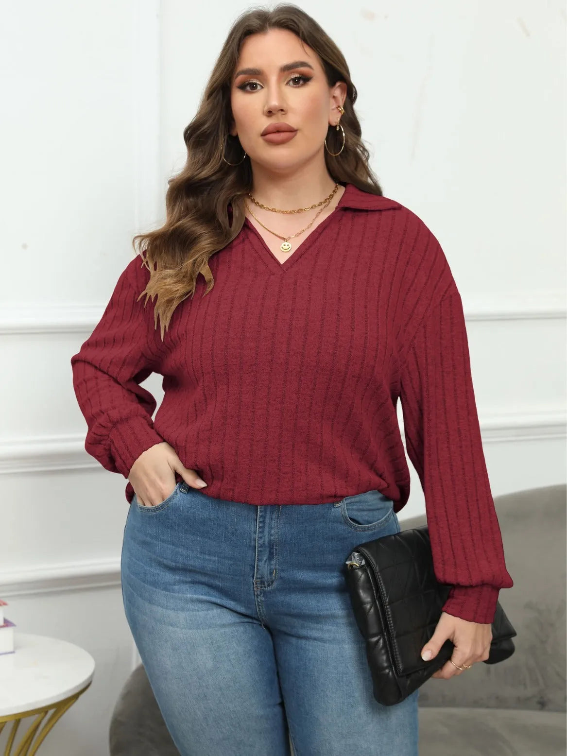 Women's plus size grey polo collar blouse with lantern sleeves made from polar fleece fabric.