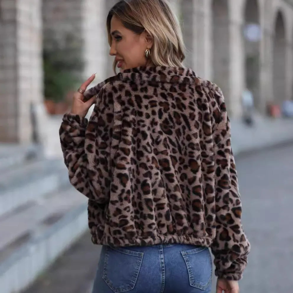 Women's loose-fit leopard print plush coat with long sleeves and a front zipper.