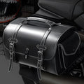 Single dark punk motorcycle side bag with a coded lock on a black background.