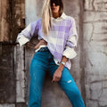 Lilac plaid print loose women's sweater with ribbed trim on long sleeves.