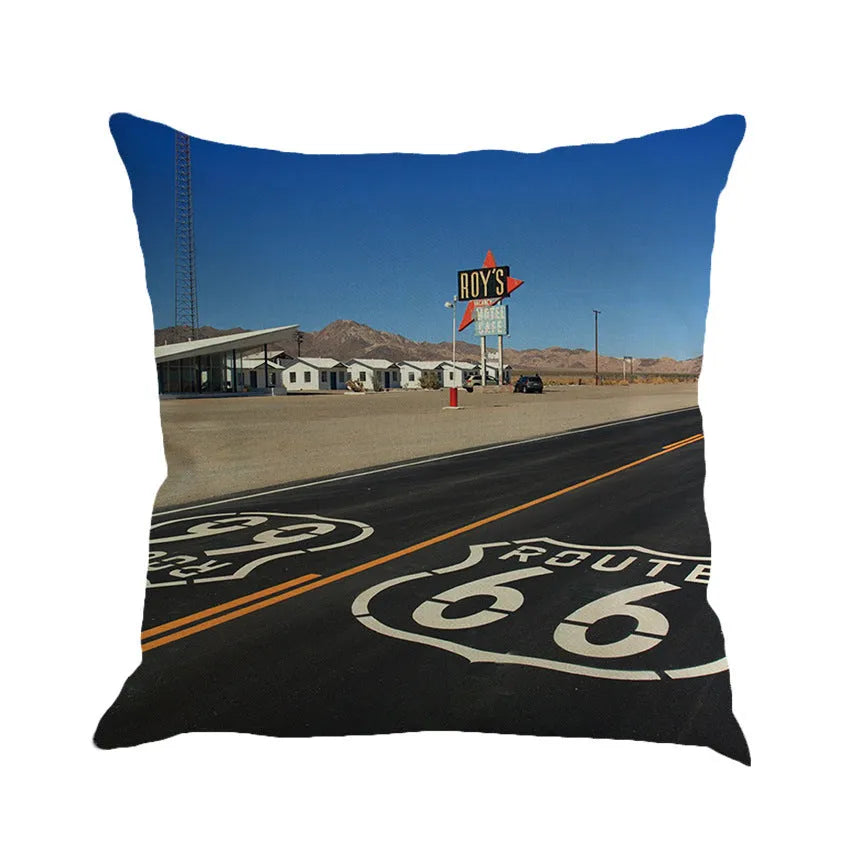Square linen cushion cover with a Route 66 landscape scene, shown in one of six available colours.
