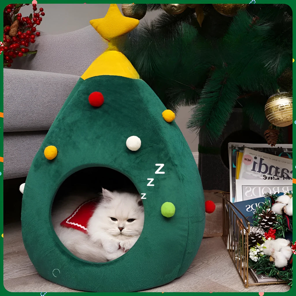Red Christmas tree shaped cave pet bed with plush interior for a cat or small dog.