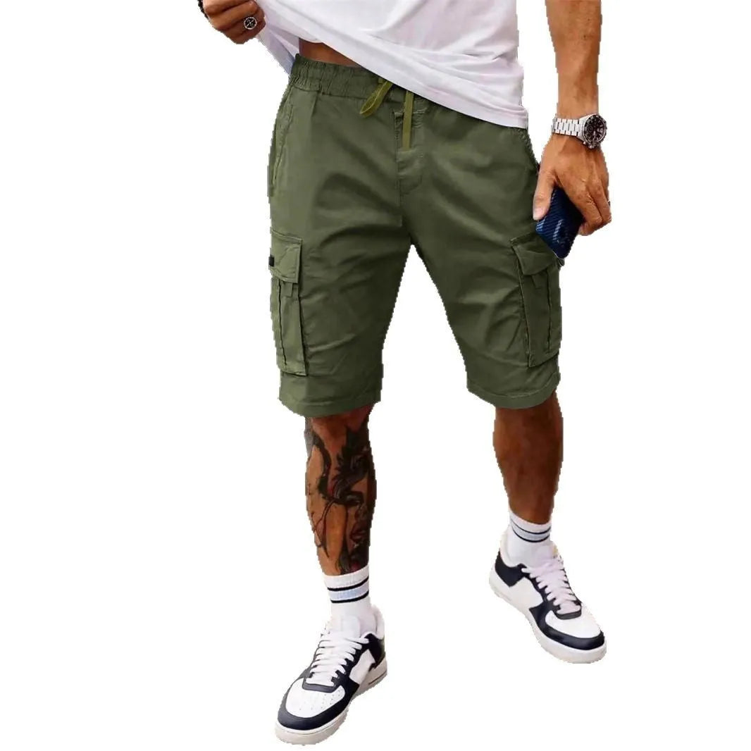 Men's straight-leg cropped workwear shorts in army green, showcasing loose fit and summer casual style.