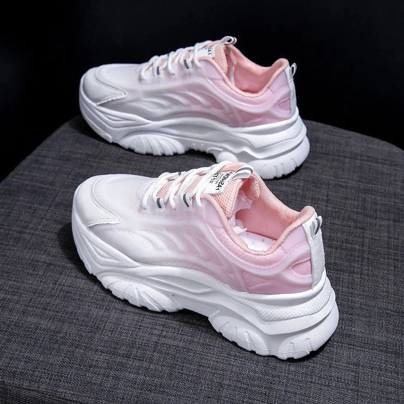 Women's satin lace-up casual shoe in pink, shown from the side on a white background.