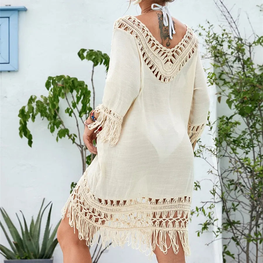 Apricot women's crochet knitted patchwork dress with half sleeves on a mannequin