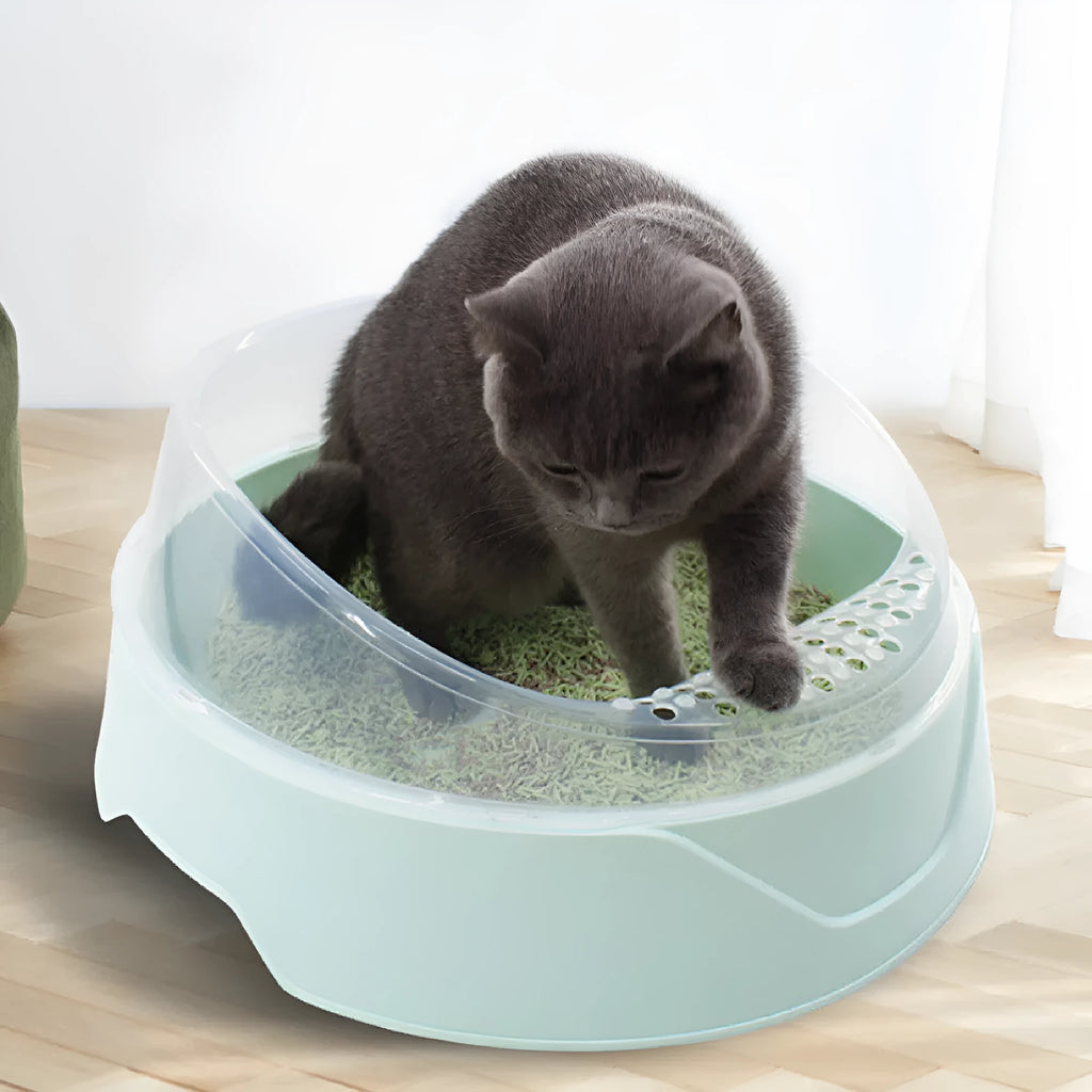 Round enclosed cat litter box in mint green or soft fog pink colours