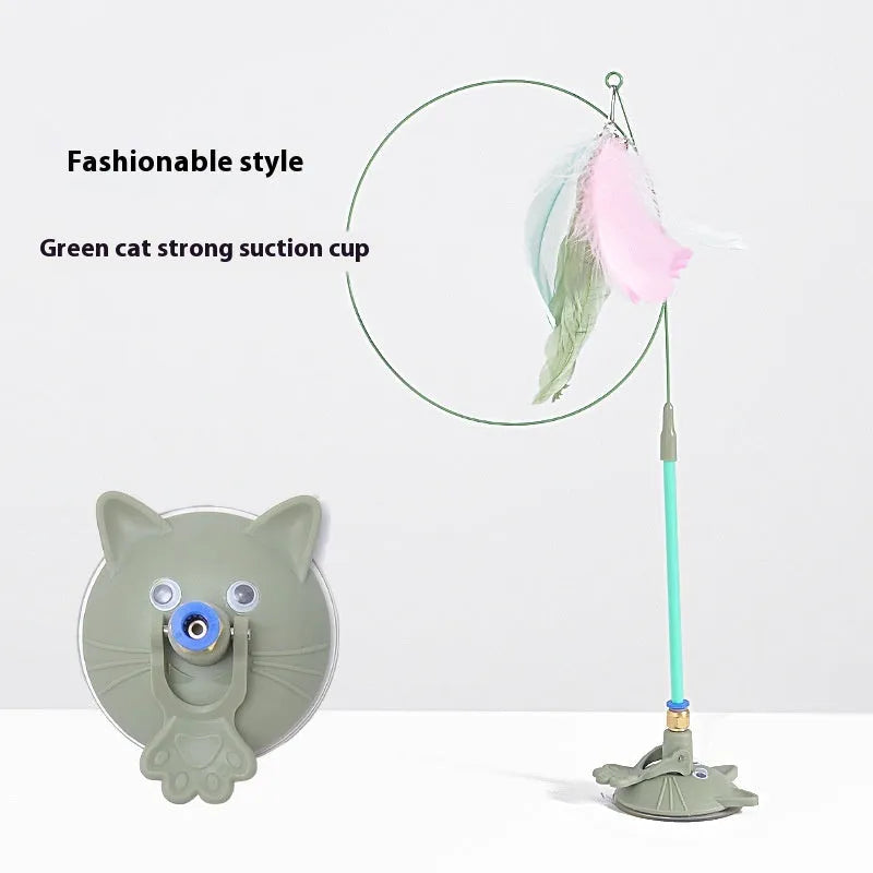 Interactive cat teaser toy with suction cup base, long handle, and dangling brush with bell attachment