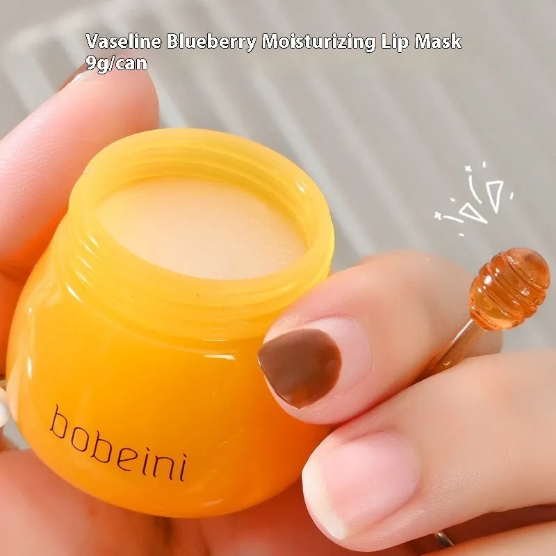 Vaseline Moisturising Lip Balm pot in 9g size with small application brush.