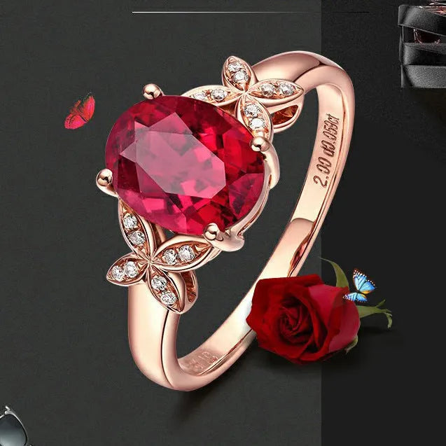 Women's heart-shaped butterfly ring in 18k rose gold plating with red or blue enamel option.