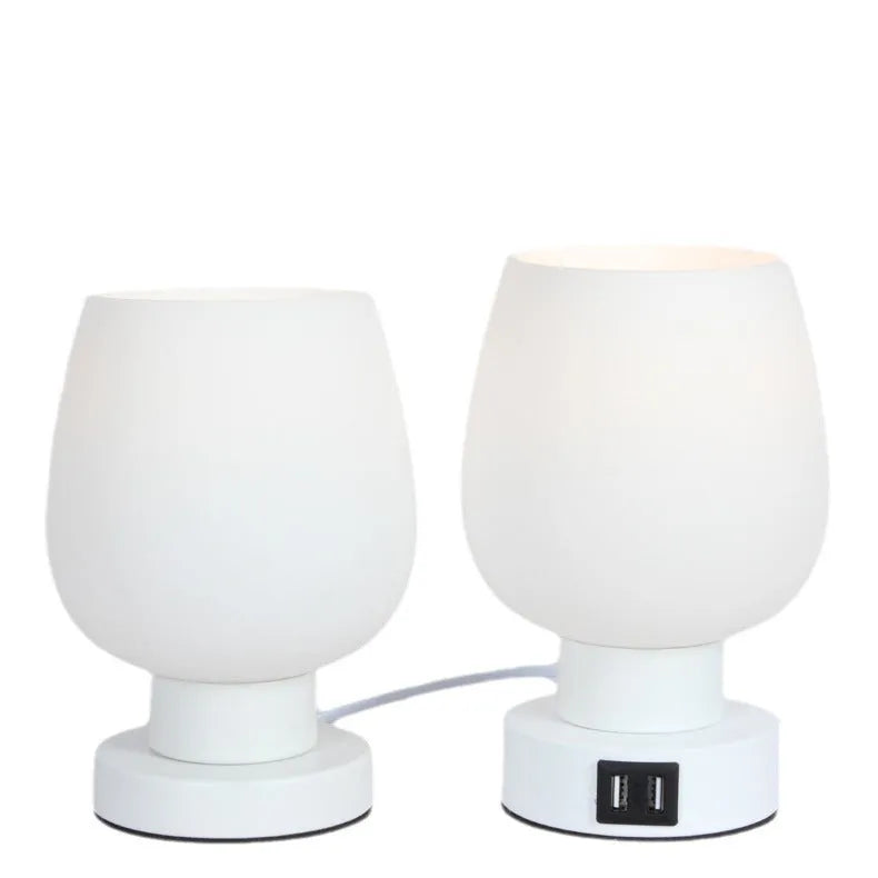 Nordic touch glass desk lamp with three colour modes and USB power on a bedside table