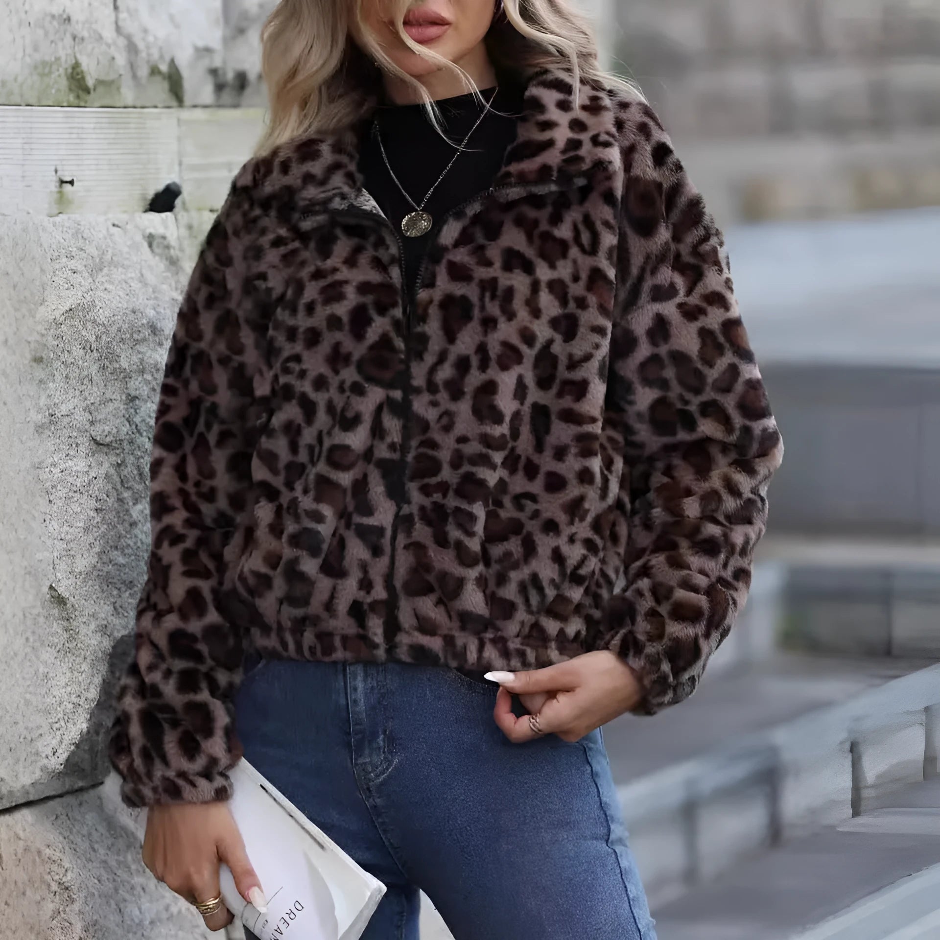 Women's loose-fit leopard print plush coat with long sleeves and a front zipper.