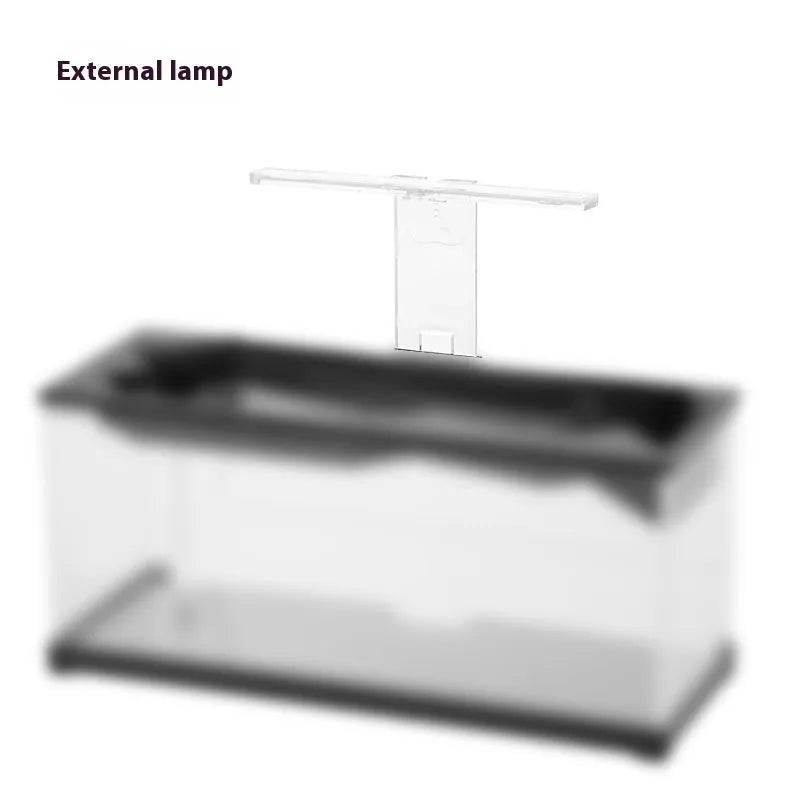 Small acrylic integrated lazy aquarium with circular filter, built-in lamp, external light, and heating mat for desktop use